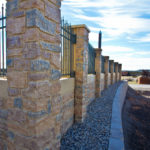 Iron Fence with Concrete Pillars