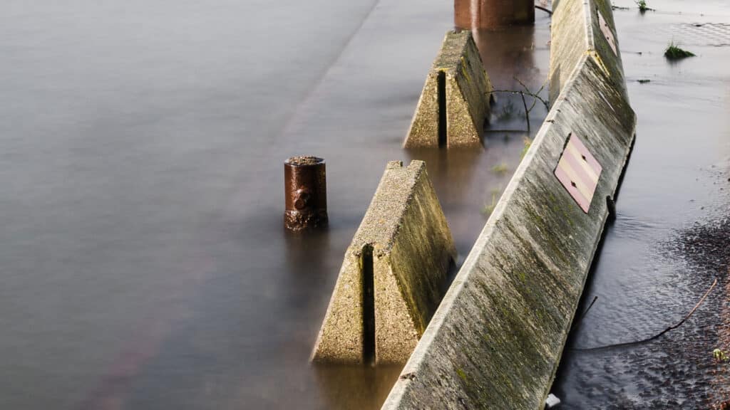 Precast concrete flood barriers protect against rising waters, ensuring durability and resilience in flood-prone areas.